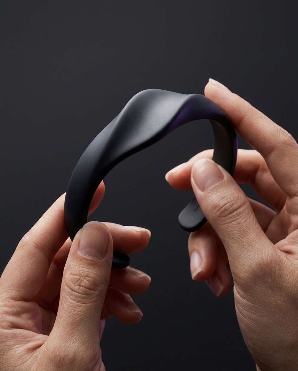 The cuff gently flexed open to show it bends to fit