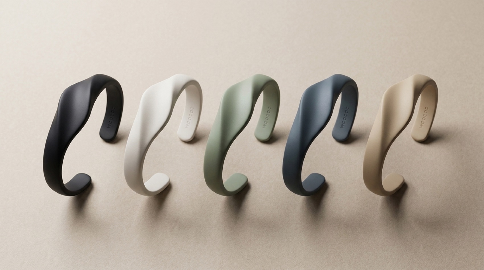 The WOOOOO bracelet in five colourways: Obsidian, Cloud, Sage, Ocean, Sand